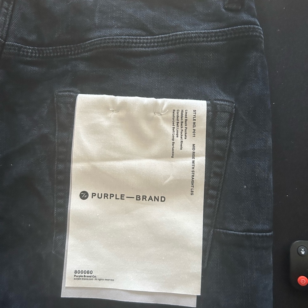 Purple brand jeans wore once color dark blue with light blue spots